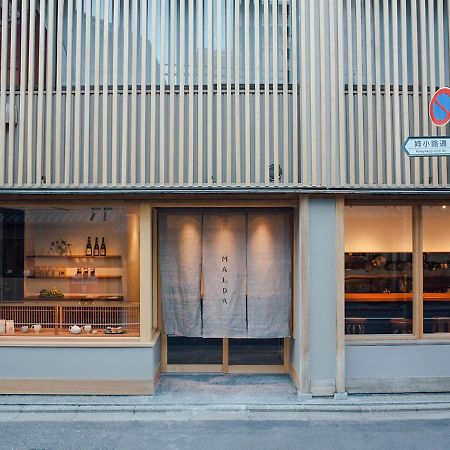 Malda Kyoto Hotel Bagian luar foto