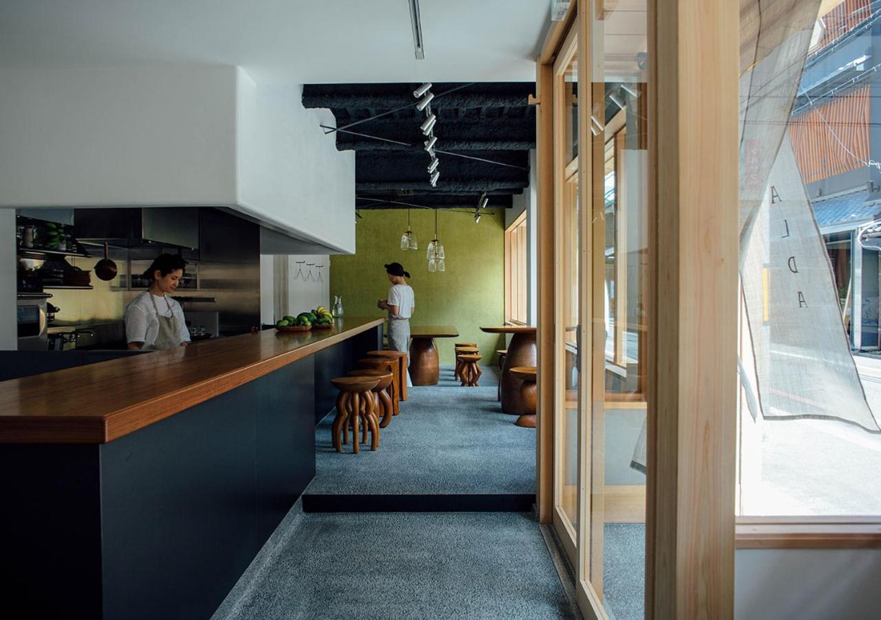 Malda Kyoto Hotel Bagian luar foto