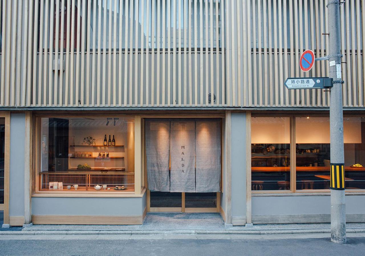 Malda Kyoto Hotel Bagian luar foto