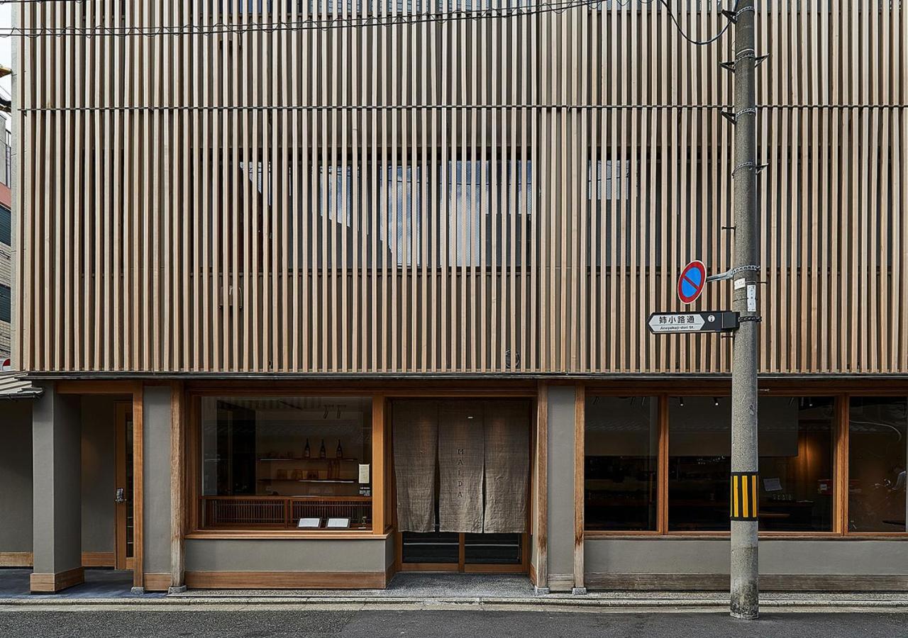 Malda Kyoto Hotel Bagian luar foto