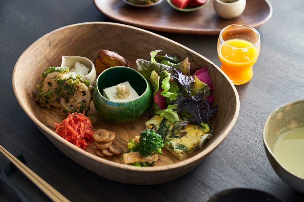 Malda Kyoto Hotel Bagian luar foto